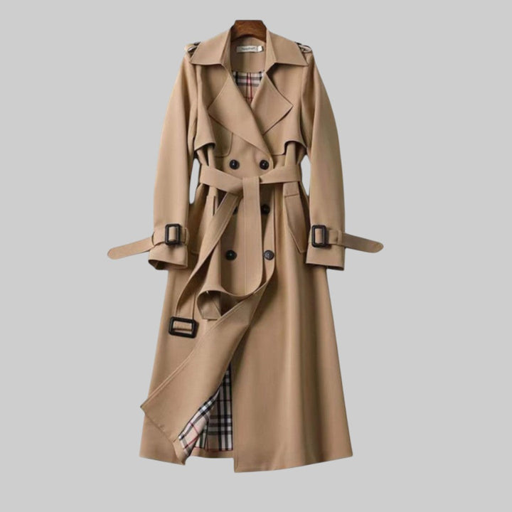 Damski długi trenchcoat ze sprzączką w kolorze Beżowy