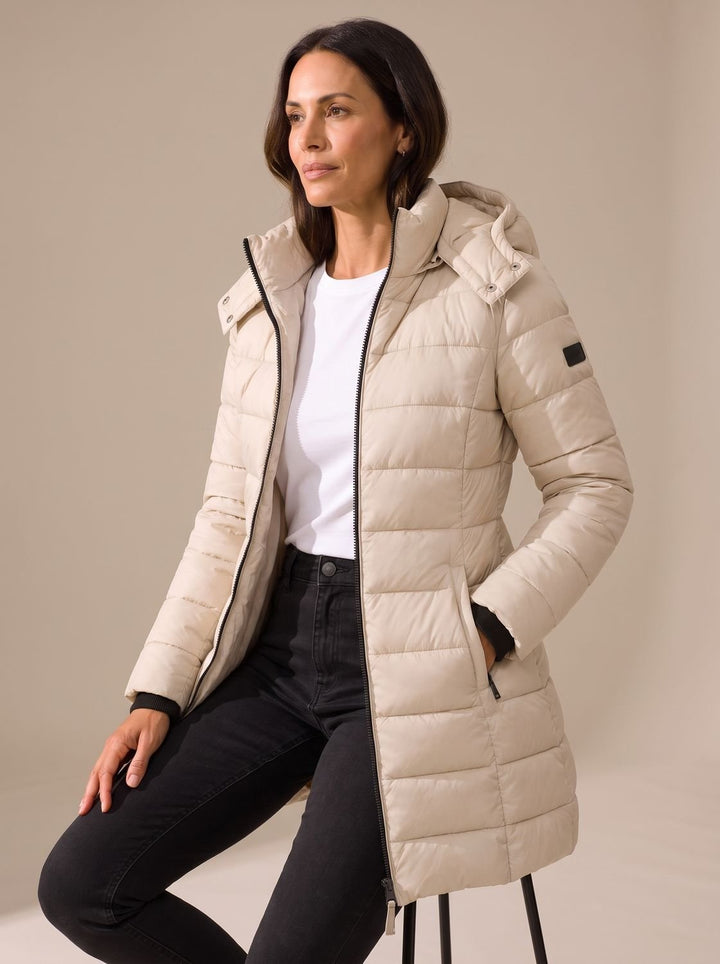 Quilted women's long puffer coat with hood in Beige