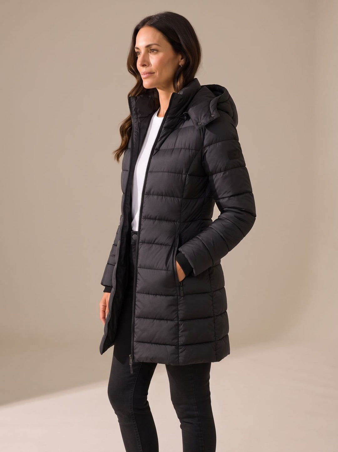 Quilted women's long puffer coat with hood in Black