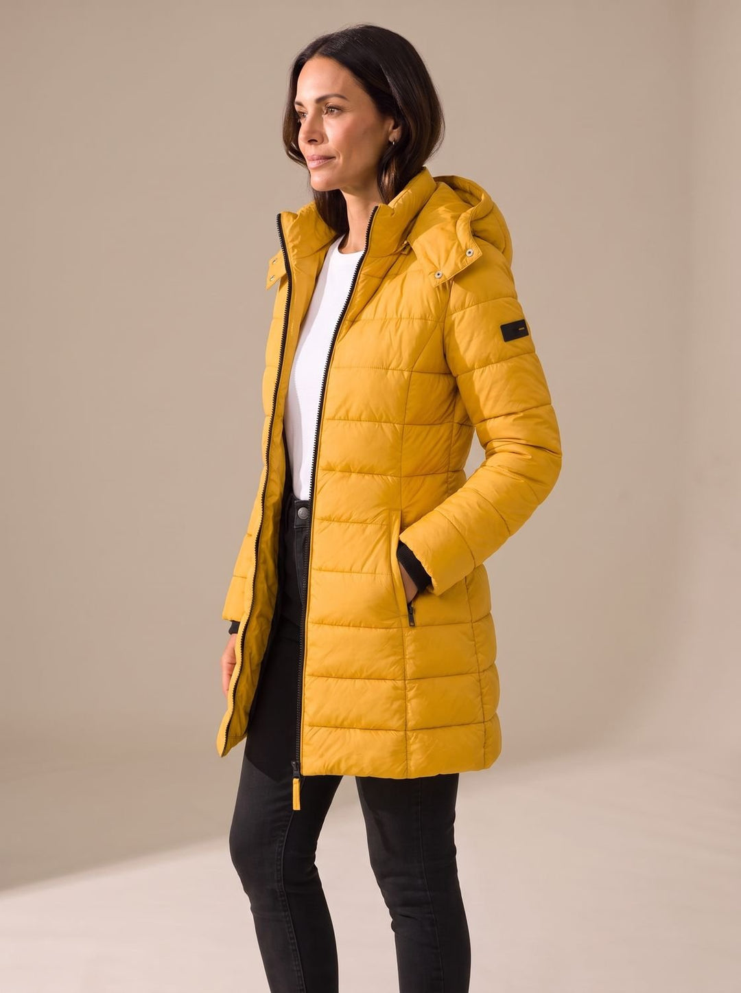 Quilted women's long puffer coat with hood in Yellow